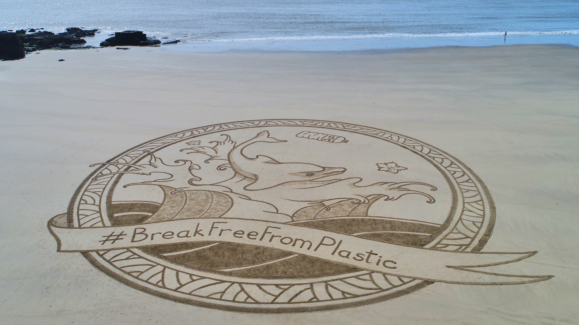 Plastic pollution beach art France 3