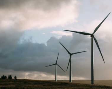 three gray wind turbine